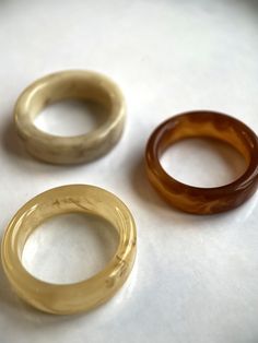 "Complete your perfect look with the acrylic resin rings from Vielring. These beautiful plastic rings belong to our adjustable ring category. They are adjustable in size and can be customised. The perfect gift for you or one of your loved ones.♡ ∙Shipping is free of charge within Germany and will be shipped within one working day. - Material: plastic, acrylic resin - Dimensions: ~ 17 mm - All our items are made by hand, with love and care.♡ ∙Packaging∙ - All orders are packed by us in a high quality \"multi-ring\" jewellery bag.♡ ∙More from us∙ https://www.etsy.com/de/shop/Vielring ∙Social Media∙ - Instagram: https://www.instagram.com/vielring - Facebook: https://www.facebook.com/vielring - Pinterest: https://www.pinterest.de/Vielring/_shop - TikTok: https://www.tiktok.com/@vielring Thank Vintage Resin Rings For Gifts, Handmade Vintage Resin Rings, Clear Resin Rings, Trendy Plastic Rings As Gifts, Trendy Clear Round Rings, Clear Plastic Jewelry For Gifts, Clear Plastic Jewelry As A Gift, Clear Plastic Jewelry Gift, Vintage Plastic Jewelry For Gifts