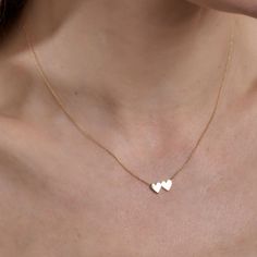 Two is better than one, and two hearts can double the power of love. The two heart pendent is featured in beautiful gold and offers a playful side-by-side heart design that shines just right. The chain and pendant are made in solid 14k yellow, white & rose gold. Handcrafted with love in New York City. Minimalist Rose Gold Heart Necklace For Anniversary, Minimalist Gold Open Heart Necklace, Rose Gold Open Heart Necklace For Gift, Valentine's Day Gold-tone Heart Necklace Gift, Open Heart Necklace For Anniversary, Valentine's Day, Heart Pendent, Classy Necklace, Seahorse Necklace, Pave Necklace