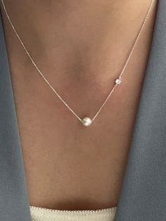 Editor's Notesbyweekend is an emotional jewelry brand that naturally permeates into everyday life and is good for giving points. - Additional cubic pendant detail- Pearl pendant- Classic and casual design- Daily point itemMeasurements(in.)One size- Size: 15.75 in. + 1.97 in.Composition & Care- Silver 925, 18K Gold Plated- Avoid direct heat and moisture- Plated products may discolor over time due to their nature.- Please be careful that discoloration may proceed faster in Silver Jewlery, Chemical Substances, Jewelry Pearl, Jewelry Brand, Casual Design, Accessories Jewelry Necklace, Be Careful, Silver Pearls, Zipper Bags