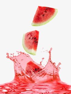 two slices of watermelon are falling into the water with splashing red liquid