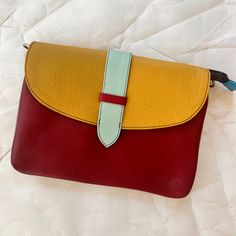 red saddle bag with mustard flap and light blue tab. Saddle Bag, Out And About, 7 H, Pet Travel, Saddle Bags, Easy Access, Saddle, Garnet, Leather Straps