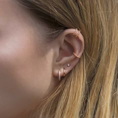 Textured Rose Gold Conch Ear Cuff that will hug your cartilage perfectly. Perfect to wear alone or paired with other huggie earrings. Sold as a single earring. Rose Gold Vermeil Hypoallergenic, lead and nickel free Thickness 1.5mm Inside Diameter 9mm Outer Diameter 12mm #E521-RG Rose Gold Drop Cartilage Earrings Single Earring, Rose Gold Huggie Ear Cuff For Everyday, Rose Gold Drop Cartilage Earring, Trendy Rose Gold Cartilage Earrings, Everyday Rose Gold Huggie Ear Cuff, Rose Gold Sterling Silver Single Ear Cuff, Trendy Huggie Ear Cuff Single Earring, Dainty Internally Threaded Huggie Earrings, Minimalist Internally Threaded Cartilage Earrings