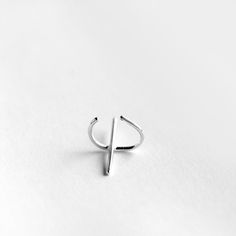 Handmade solid sterling silver ear cuff. Each earring consists of a cuff with a perpendicular bar. Dimensions: 20x12mm Width: 1mm Sold: Individually or as a pair * Suitable for non-pierced ears. Visit my shop: http://www.etsy.com/shop/jewelrymirta © MIRTA Minimalist Ear Cuff, Bar Dimensions, Earring Minimalist, Silver Ear Climbers, Cuff Earring, Ear Climbers Earrings, Silver Cleaner, Silver Choker Necklace, Wrap Earrings