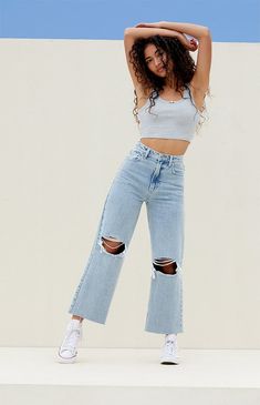 The Light Indigo Ripped Cropped Wide Leg Jeans from PacSun bring a rebellious update to your denim collection. These high-waisted jeans feature a trendy cropped wide-leg silhouette, ripped knee details, and a raw-cut hem.

Learn more about PacSun eco items Cheap Forever 21 Cotton Jeans, Pacsun Outfits, Wide Leg Ripped Jeans, Ripped Jeans For Women, Denim Photoshoot, Ripped Straight Leg Jeans, Teen Jeans, Clothing Board