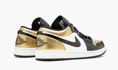 The Air Jordan 1 Low “Gold Toe” is a special release of the low-top Jordan 1 that borrows a popular colorway from the original high-top.  The metallic gold, white, and black patent leather construction that first appeared on the Jordan 1 High in 2018 is mirrored on this Jordan 1 Low from 2019.  Unlike the high-top’s asymmetrical color blocking, this low features the same look on the lateral and medial sides.  Each pair is completed with a tonal Jumpman logo embroidered on the tongue and the clas Jordan Gold, Jordan Low, Low Top Jordans, Jumpman Logo, Jordan 8, Womens Air Jordans, Air Jordan 12 Retro, Jordan 12 Retro, Air Jordan 1 Low