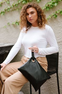 hit the town in style with the alexa oversized clutch.  the perfect way to carry all of the day's essentials while looking super cute!  12 inches wide and 9 inches tall, you'll find it's the perfect size to fit everything you need, without being so bulky that you regret taking it into the store with you. complete with Oversized Clutch, The Store, Wrist Strap, In Style, Carry On, Super Cute