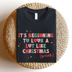 a t - shirt that says it's beginning to look a lot like christmas break