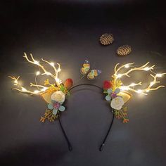 PRICES MAY VARY. LED Christmas headwear is made of soft plush fabrics,plastic,Resin,artificial branches and LED lights,looks stylish and cute,loved by everyone. Reindeer antlers hair accessories, one size, can be worn by adults. Light up headband perfect for Christmas,Halloween,New years day,party,club,festival,photography etc.It is also a best chioce to give it to your family or friends as a birthday gift. Animal flower hair hoop are easy to use,the hair hoop has a battery, unplug the insulator New Years Day Party, Xmas Hair Accessories, Christmas Gift Costume, Christmas Crowns, Christmas Party Hair, Holiday Headpiece, Christmas Headdress, Christmas Headwear, Christmas Hair Clips