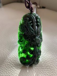 🌈 Chinese Dragon Jadeite Jade Pendant, Green 🌷 Untreated Natural Jadeite/ Grade A Jade 🌷 Certified : YES 🌷 Jade from Myanmar/ Burma 🌷 100% handmade carving 🌷 Dimensions : 79.4 x 37.2 x 13.5mm 🌷 Color : Green 🌷 Free standard shipping from Hong Kong with tracking included 🌷 Take approximately 7-21 days to arrive worldwide ❤️ Dragon Mythology and Symbolism Dragon is the most powerful and imperial creature in Chinese mythology, thus, the traditional and unsurpassed status in Feng Shui. The Handmade Green Jade Gemstones, Handmade Green Emerald Gemstones, Dragon Mythology, Chinese Emperor, Burma Myanmar, Chinese Mythology, Chinese Jewelry, Cosmic Energy, Jade Bangle