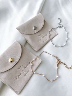 These gorgeous bracelets and pouches are the perfect way to show your bridal party your appreciation for being part of your special day. They make the cutest keepsakes for your bridal party to wear on your wedding day and beyond! For the morning of your wedding day or your proposal boxes, these are the perfect addition and are guaranteed to make the ladies in your life feel special. Sentimental Bridesmaid Gifts, Elegant Personalized Bracelet As Gift, Elegant Personalized Bracelet Gift, Elegant Personalized Bracelet For Gift, Elegant Adjustable Bridesmaid Bracelets, Elegant Rose Gold Bracelets For Bridesmaid Gift, Adjustable Silver Jewelry For Bridesmaid, Elegant Bridesmaid Bracelets, Adjustable Silver Bridal Accessories For Bridal Shower