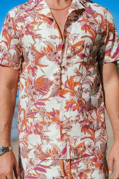 Elevate your summer style with our Coral Flower Tropical Button-Up Shirt for men. The vibrant print exudes tropical vibes, making it an ideal choice for both casual and beach-ready looks. Product code: CBA12A4A002DK Features:  Woven  Collared neckline  Short sleeves  Front buttons  Regular fit Pattern: Tropical Wash Method: Hand Wash Material: 100%POLYESTER. Printed Button-up Beach Shirt, Summer Vacation Button-up Short Sleeve Shirt, Summer Collared Camp Shirt For Beach, Summer Camp Shirt For Beach With Collar, Summer Short Sleeve Button-up Shirt For Beach, Summer Vacation Short Sleeve Shirt, Collared Hawaiian Shirt With All Over Print For Summer, Summer Hawaiian Beach Shirt Button-up, Summer Button-up Hawaiian Shirt For Beach