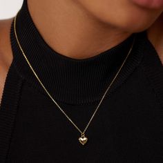 Radiate elegance with the Golden Heart Necklace, crafted for sophisticated women. Embrace its allure, elevate your style, and captivate with exquisite design. A treasure that enchants. Metal: 14K Gold Vermeil pendant Dimensions: 8 mm / 0.32" x 9 mm / 0.35" Chain Length: 40 cm / 15.75" with extensions from 40 cm to 45 cm (15.75" - 17.72") Polished Yellow Gold Charm Necklaces, Elegant Heart Necklace Tarnish Resistant As Gift, Formal Fine Jewelry With Heart Charm, Formal Heart Pendant Jewelry With Heart Charm, Formal Heart Charm Jewelry With Heart Pendant, Yellow Gold Pendant For Valentine's Day, Classic Necklace With Delicate Chain For Valentine's Day, Classic Heart Necklace For Gift, Classic Jewelry With Clavicle Chain And Heart Pendant