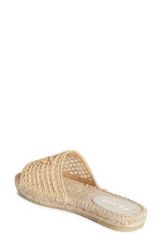 Cruise into warm weather in this easygoing espadrille slide sandal with a breezy mesh-and-crocheted-raffia upper paired with a braided-jute footbed. Textile upper and lining/synthetic sole Made in Italy Designer Shoes Vacation Woven Leather Slip-on Espadrilles, Casual Woven Leather Espadrilles, Natural Color Espadrilles With Woven Sole For Vacation, Beige Woven Leather Espadrilles For Spring, Straw Summer Espadrilles With Textured Sole, Spring Beige Woven Leather Espadrilles, Casual Natural Espadrilles With Removable Insole, Comfortable Slip-on Straw Espadrilles, Comfortable Straw Slip-on Espadrilles