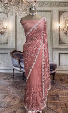 Beautiful Peach net saree with thread and stone work and running blouse piece Designer Net Pre-draped Saree With Unstitched Blouse, Festive Pre-draped Saree With Lace Work, Reception Blouse With Traditional Drape And Lace Work, Traditional Drape Blouse Piece With Lace Work For Reception, Bollywood Style Wedding Pre-draped Saree With Lace Work, Semi-stitched Pre-draped Saree With Lace Work For Wedding, Semi-stitched Lace Work Pre-draped Saree For Wedding, Wedding Pre-draped Semi-stitched Saree With Lace Work, Semi-stitched Net Pre-draped Saree For Diwali