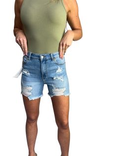 Introducing the heavily destructed Frey Hem Shorts - perfect for those who love to play rough with fashion! 93% Cotton, 5% Polyester, 2% Spandex. High-waisted Denim Shorts With Frayed Hem, Denim Five-pocket Shorts, Mid-rise Distressed Cotton Jean Shorts, High-waisted Shorts With Frayed Hem In Medium Wash, Jean Shorts, Denim Jeans, Spandex