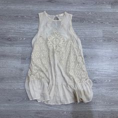 Mini Dress But Still Covers! Very Soft Daytime Sleeveless Mini Dress With Lace Trim, Casual Beige Midi Dress With Lace Trim, Cream Sleeveless Summer Dress, Flowy Lace Midi Dress Casual Style, Flowy Lace Casual Midi Dress, Cream Lace Trim Dress For Vacation, Flowy Off-white Dress With Lace Trim, Flowy Off White Dress With Lace Trim, Off-white Dresses With Lace Trim For Day Out