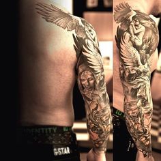 a man with tattoos on his arms and arm is standing in front of a mirror