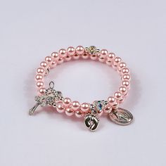 Pretty in Pink Baby Girl   Hand-crafted rosary bracelets   https://ourladysrosegarden.com/product/pretty-in-pink-baby-girl #RosaryBracelets Cheap Beaded Rosary Bracelet, Adjustable Pink Rosary Bracelet At Affordable Price, Pink Pearl Bracelet With Pearl Charm, Spiritual Pink Jewelry For Birthday, Pink Pearl Charm Jewelry Gift, Pink Pearl Bracelet Gift, Pink Pearl Jewelry For Gift, Pink Pearl Jewelry Gift, Pink Pearl Jewelry For Gifts