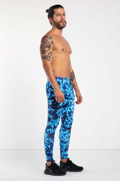 Description: Blue and Black Printed Men's Leggings Breathable & Moisture Wicking 4-Way Stretch Fabric Machine Wash Cold, Quick Drying High Stretch Nylon / Spandex Bolt Logo Patch This design does not have pockets Model is 5’8” (177cm) tall, 32” (82cm) waist and wears size Small. Blue Moisture-wicking Nylon Leggings, Blue Nylon Sportswear Yoga Pants, Blue Nylon Full-length Activewear, Blue Nylon Athleisure Yoga Pants, Blue Nylon Yoga Pants, Blue Nylon Yoga Pants Sportswear, Blue Tight Go-dry Activewear, Blue Nylon Yoga Pants For Training, Blue Training Bottoms