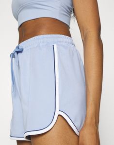 Cotton On Body Women's Retro Gym Shorts Periwinkle Blue Medium The wear-everywhere retro gym short is the ideal garment for the coming season. It has an easy relaxed fit style and elasticated waist with drawcord. This durable cozy short can be perfectly matched with lightweight tops or jumpers for a fresher style. Approximate model height is 5'6" and she is wearing a size S Mid-thigh length, approximate inseam - 2", compression fit Inspired for - training, running, cycling, yoga Shorty short len Blue Moisture-wicking Athletic Shorts With Relaxed Fit, Moisture-wicking Blue Activewear Shorts, Blue Moisture-wicking Athletic Shorts, Fit Inspired, Retro Gym, Blue Cotton Activewear With Built-in Shorts, Blue Cotton Pull-on Shorts, Training Running, Periwinkle Blue