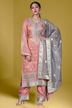 This stunning Partywear Suit D-167 is adorned with intricate mirror and stone work, adding a touch of elegance and glamour to any special occasion. Don't miss out on the opportunity to shine and turn heads with this beautiful suit. Order now and make a statement in style! Elegant Silk Palazzo Set With Dori Work, Elegant Pink Art Silk Kurta, Elegant Silk Kurta With Dori Work, Elegant Pink Chanderi Palazzo Set, Festive Party Wear Embellished Kurta, Elegant Pink Palazzo Set With Dori Work, Formal Festive Kurta With Mirror Work, Formal Kurta With Mirror Work For Festive Occasions, Elegant Palazzo Set With Dori Work