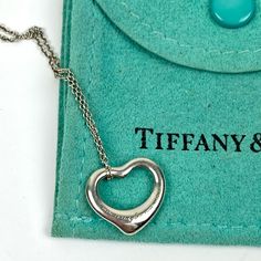 Tiffany & Co Elsa Perretti Open Heart Small Necklace %100 Authentic Tiffany & Co Open Heart Small Necklace Chain Folded In Half Is 9" See Picture Needs To Be Polished, Previously Loved But In Great Condition Fast Shipper Does Not Include The Tiffany’s Bag But Will Be Wrapped In A Brand New White Jewelry Box And Inside A White Sash Bag Elegant Heart Pendant Necklace With Hallmarks, Designer Polished Finish Necklace, Luxury Heart-shaped Necklace For Formal Occasions, Luxury Heart Shaped Necklace For Formal Occasions, Luxury Heart Necklace For Formal Occasions, Formal Heart Cut Necklace, Classic Heart Charm Necklace For Formal Occasions, Elegant Heart Pendant Necklace For Formal Occasions, Elegant Engraved Heart Necklace For Mother's Day