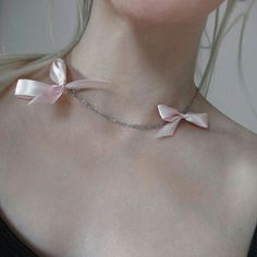 Dusty pink bow ribbon necklace on subtle silver chain for a romantic birthday or anniversary gift for a girlfriend. Light and fun summer jewelry.  𝐒𝐈𝐙𝐄: ➤ Adjustable Fits Circumference from 16″ - 20″ (40.6cm - 50.8cm)  𝐃𝐄𝐓𝐀𝐈𝐋𝐒: ➤ Materials: Stainless Steel, Ribbon ➤ Ready to Ship ---- Dusty Pink Bow Choker Necklace ---- -The Pink Bow Necklace is a delicate choker necklace featuring two dusty pink ribbon bows and double stainless steel chain design.  -Great for a fun summer day and night.  𝐇𝐎𝐖 𝐓𝐎 𝐎𝐑𝐃𝐄𝐑? 2. Add to cart 3. Select desired shipping method  𝐒𝐔𝐆𝐆𝐄𝐒𝐓𝐄𝐃 𝐂𝐀𝐑𝐄: Use water and a drop of mild detergent. Rinse, then line dry. Always make sure to wipe off water and dry your jewelry completely after cleaning. Do not use any products containing alcohol. Be Delicate Choker Necklace, Industrial Necklace, Romantic Birthday Gifts, Arm Cuff Bracelet, Bow Choker, Delicate Choker, Choker Silver, Romantic Birthday, Ribbon Choker