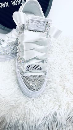 "CONVERSE CHUCK TAYLOR ALL STAR LOW TOP Encrusted with Crystals and high quality pearls. Youth and women's Available - Handmade. The iconic Chuck Taylor gets a stylish new boost on the feminine yet edgy Converse Women's Chuck Taylor, ❤️❤️❤️❤️❤️❤️❤️❤️❤️❤️❤️❤️❤️❤️❤️❤️This is the listing for the name and/or date to be added https://etsy.me/3d8jUEH for an ADDITIONAL CHARGE ❤️❤️❤️❤️❤️❤️❤️❤️❤️❤️❤️❤️❤️❤️❤️❤️ \"MRS\" or Initials on laces $7 \" BRIDE\" or \"DATE\" on back $8 \" NAME\" ie Mrs. Smith on si Wedding Converse Bride, Converse Bride, Wedding Tennis Shoes, Bedazzled Converse, Wedding Sneakers For Bride, Bride Converse, Converse Wedding Shoes, Stars Wedding, Purple And Gold Wedding