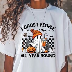 A spooky fall-themed T-shirt that reads 'I Ghost People All Year Long'. This Comfort Colors 1717 tee in multiple sizes from S to 4XL is perfect for Halloween enthusiasts and those who love all things ghostly. The garment-dyed fabric provides a soft color and texture, while the double-needle stitching ensures durability. With a relaxed fit and classic crew neckline, this tee is versatile for casual or semi-formal settings. Product features - Available in S to 4XL for the perfect fit - Double-need Ghost People, Fall Apparel, Spooky Fall, Halloween Crewneck, Dyed Fabric, Autumn Theme, Soft Colors, Tshirt Colors, Semi Formal