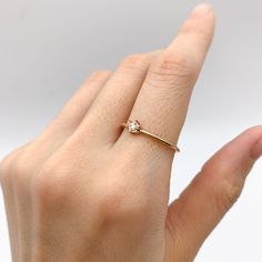 Dainty Diamond Rose Gold Ring set with Natural Diamond, size 2 millimeters diameter, 0.6 Carats.Solid 14k Rose Gold ☞ made to last.Click here for ☞ Solid Gold CollectionDiamond Details:• CERTIFIED Natural Diamond• Weight: 0.6 Carats• Dimensions: 2mm• Color: G• Clarity: I1• Cut: Very GoodSolid Gold Details:• 1 gram of 14k Solid Rose Gold• Dimensions: Band width ≈ 1mm, thickness ≈ 1mm• Lasts a lifetime - Perfect for everyday use (won’t tarnish)!*Final weight & dimensions depending on the chosen ri Real Diamond Ring, Rose Gold Ring Set, Real Diamond Rings, Gold Letter Necklace, Rose Gold Diamond Ring, Gold Ring Sets, Solid Gold Jewelry, Silver Gifts, Gold Diamond Rings