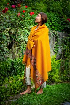 ART: S-06M COMPOSITION: 100% Merino wool SIZE: 100x200cm / 40x80in approx. THICKNESS: Medium DETAILS: With fringes WEIGHT: from 250g to 500g / from 0.5lb to 1lb This shawl is a living testimony to the Himalayan culture. Traditionally, we recognized where a person came from by the motif we found on his shawl or hat. Each motif is represented by a region of the Himalayas. This particular Himalayan shawl, specifically, presents us with the traditional motif of the Kullu region. Over time, the distinction of regions by their patterns has become less evident and now different regions produce a variety of patterns. The weaving of these shawls requires a certain expertise and a long application to create such exceptional borders. With its finesse, too, it is fabulous as an accessory and adds a re Shawl Photoshoot, Wool Art, The Himalayas, Wool Shawl, Aging Well, Clothes Line, Embroidery Projects, Himalayan, Shawls And Wraps