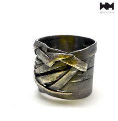 This sculptural ring is totally original and unique since there are no molds. Each of them is handcrafted so they all have their own idiosyncrasy and personality. It is certainly a statement ring that will surely become one of your favourites.  This ring is made of sterling silver,  and finished with a patina that gives it that beautiful depth and palette of greys. The ring is very comfortable and will change over time, depending on the use, giving rise to a beautiful antique tone, which brings Unique Hand Forged Wide Band Ring, Unique Hand Cast Wide Band Rings, Unique Oxidized Wide Band Rings, Sculptural Ring, Upcycled Leather, Art Jewelry Contemporary, Bold Jewelry, Statement Art, Mens Ring