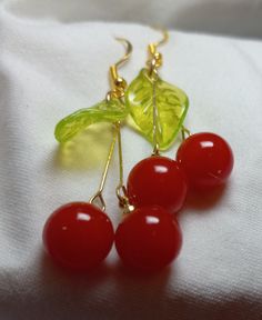 Adorable cherry dangle earrings.  Lightweight with 14kt gold overlay ear hooks. Gold Overlay, Ear Hook, Etsy Earrings Dangle, 14kt Gold, Glasgow, Jewelry Earrings Dangle, Dangle Drop Earrings, Dangle Earrings, Cherry