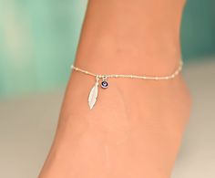 This anklet has a feather charm with an evil eye. The ankle bracelet is sterling silver 925. It is a dainty piece of jewelry that is great for the summer. The anklet has an extension so it can be adjusted to fit comfortably with different shoes. I can also customize the size for you, so feel free to message me if you need a custom order, or if you have any questions. Evil Eye Anklet Silver, Anklet Designs Beads, Evil Eye Jewelry Bracelet, Evil Eye Bracelet Silver, Ankle Bracelets Boho, Evil Eye Anklet, Silver Anklets Designs, Cute Anklets, Silver Bracelet For Women