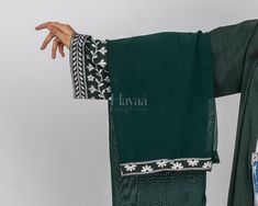 Introducing our Lana Embroidered Sleeve Abaya Collection, where each piece features exquisite sleeve embroidery that adds a touch of elegance perfect for both casual and formal wear. These versatile abayas are crafted for comfort and style, making them perfect to wear to university. Blend practicality with sophisticated design, ensuring you look and feel your best. Features: Perfect for University: The abayas in this collection are ideal for university wear, offering a blend of comfort, practica Green Embroidered Abaya For Wedding, Emerald Green Abaya, Traditional Embroidered Abaya, Embroidered Hijab, Green Abaya, Green Embroidered Long Sleeve Abaya, Green V-neck Abaya, Embroidered Abaya, Abaya Collection