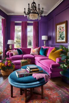 a living room with purple walls and colorful furniture in the center, along with a chandelier