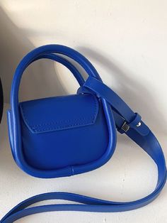 Bag For Love - Mini Double Handle Satchel Bag - Women Satchels Product Description Color Blue Strap Type Adjustable Pattern Type Plain Style Fashionable Bag Size Small Quantity 1 piece Type Saddle Bag Composition 100% Polyester Material PU Leather Size Chart INCH CM Size Bag Width Bag Height Bag Length Strap Length one-size 2.2 3.5 5.1 40.2 Size Bag Width Bag Height Bag Length Strap Length one-size 5.5 9 13 102 Similar Products h2 { text-align: center; } .red-box { width: 100%; display: flex; fl Plain Style, Saddle Bag, Satchel Bag, Bag Women, Olivia Mark, Kate Spade Top Handle Bag, Satchel Bags, Saddle Bags, Polyester Material