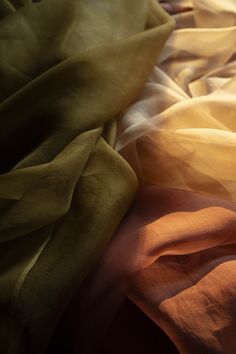 Ochre {Gossamer Silk Fabric} Hand-loomed, 100% organic silk fabric. This material has a unique body and texture. The light airiness of our gossamer silk creates a transparent veil of color when used for flatlay photography or vignette styling. Create a sculptural look when tucked and pinned. Creates a show-stopping look when draped on a table, or hanging as a backdrop. Planning a large event? Contact us for larger quantities here. Ochre Gossamer Silk Fabric has many uses! • Use as a transparent Draped Fabric Backdrop, Draped Fabric Photography, Textile Aesthetic, Silk Fabric Texture, Narnia Oc, Transparent Veil, Elegant Fabrics, Vignette Styling, Flatlay Photography