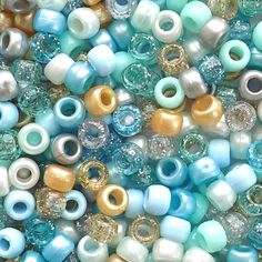 many different colored beads are shown together