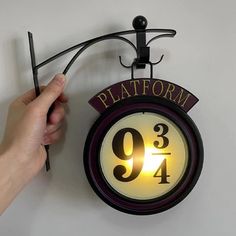 a clock with the number 904 displayed on it's face and hands pointing at it