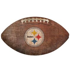 an old football with the pittsburgh logo on it