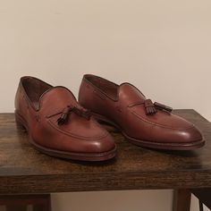 These Loafers From Allen Edmonds Are A Size 11.0d. They Have Not Been Worn, And Come With The Original Box. Elegant Slip-on Tassel Loafers With Rubber Sole, Luxury Semi-formal Tassel Loafers With Rubber Sole, Luxury Slip-on Tassel Loafers For Formal Wear, Elegant Plain Toe Slip-ons For Galas, Elegant Semi-formal Goodyear Welted Moccasins, Luxury Formal Wingtip Slip-ons, Luxury Moc Toe Tassel Loafers For Galas, Semi-formal Italian Tassel Loafers With Plain Toe, Elegant Brown Tassel Loafers For Formal Occasions