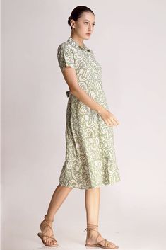 The Alicia shirt midi dress is a springtime staple. Crafted with care from cotton, its charming block print adds flair to its warm green shade. Featuring a collared design and front button closure, this jade short-sleeve maxi dress exudes casual elegance. With two handy pockets, it's as practical as it is stylish, making it perfect for effortless chic on sunny days.Material: Cambric - 100% cottonStyle/Print: Hand Block PrintNumber of Pockets: 2Length: 45 inchesOccasion: CasualColor: Jade Spring Collared Midi Dress With Relaxed Fit, Cotton Maxi Length Shirt Dress For Daywear, Cotton Maxi Shirt Dress For Daywear, Casual Collared Neckline Dress With Relaxed Fit, Spring Cotton Shirt Dress With Short Sleeves, Spring Cotton Shirt Dress With Collared Neckline, Cotton Short Sleeve Shirt Dress For Spring, Cotton Shirt Dress With Short Sleeves For Spring, Summer Cotton Maxi Shirt Dress