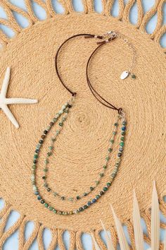 Indulge in the beauty of the sea with our Pacifica Collection! Each piece is meticulously handcrafted with stunning shades of blue, capturing the essence of ocean waves and clear skies. Sterling Silver (Lead & Nickel Free) Emerald, Chrysocolla 20-22" adjustable with sterling silver lobster claw clasp We hand select our natural materials, thus there may be slight variations in color and/or size that will not detract from the overall aesthetic. Our unique handcrafted designer jewelry for women is Adjustable Ocean Colored Beaded Jewelry, Adjustable Chrysocolla Necklaces With Natural Stones, Adjustable Chrysocolla Necklace With Natural Stones, Handmade Adjustable Ocean Color Necklace, Adjustable Amazonite Beaded Necklaces, Adjustable Turquoise Chrysocolla Beaded Necklaces, Adjustable Chrysocolla Natural Stones Necklaces, Adjustable Double Strand Agate Necklace, Adjustable Amazonite Necklace With Polished Beads