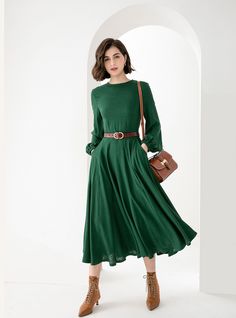 "New Arrivals Green midi Linen dress with pockets for spring autumn. DETAIL * 50% Linen, 50% cotton * Two side pockets * Long Lantern Sleeve * Small collar * Fit and flare dress * Back zipper closure * Perfect for summer, spring, autumn * Dry clean * The model is 175cm (5′9″) tall with a 80cm (31.5\") bust, 66cm (26\") waist. She is wearing in size XS CUSTOM MADE SERVICE If you * Change other color * Can't find your size in our size Chart * Change the length * Your Height is not Between 5'1\" - Green Fit And Flare Dress, Green Dress Styling, Green Midi Dress With Pockets For Work, Green A-line Midi Dress For Fall, Green A-line Maxi Dress, Green Linen Midi Dress, Green A-line Maxi Dress For Work, Chic Green Linen Midi Dress, Elegant Green Midi Length Linen Dress