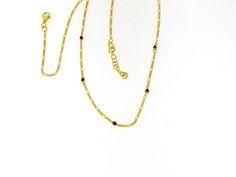 Sterling silver 925 onyx necklace with yellow gold plated and minimalist design, perfect for any occasion and to combine with other necklaces, chain measure: 40 cms (15-3/4 inin) width: 2 mm (0-25/32 inin) Elegant Black Necklace With Cable Chain, Elegant Black Gold Plated Chain Necklace, Elegant Black Gold-plated Chain Necklace, Elegant Black Jewelry With Cable Chain, Minimalist Onyx Yellow Gold Jewelry, Minimalist Yellow Gold Onyx Jewelry, Gold Onyx Necklace With Adjustable Chain, Handmade Minimalist Yellow Gold Chain Necklace, Yellow Gold Onyx Pendant Necklace