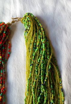 African beaded necklace, multicolored handmade chunky necklace, tribal jewelry. Colour -- yellow with red and mixed colour beads. Length --24 inches. It has a unique not thus makes it more beautiful . Ships via dhl express. Thank you for stopping by. Handmade Multi-strand Beads As Gift, Handmade Green Beads For Crafting, Green Beaded Bracelets With Colorful Beads For Crafting, Multicolor Beaded Bracelets With Dangling Beads As Gift, Bohemian Faceted Beads For Crafting, Multi-strand Dangling Beads For Gift, Unique Green Beads For Crafting, Green Tiny Beads Jewelry For Crafting, Artisan Green Beaded Necklaces With Beaded Chain