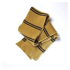 two yellow and black knitted scarves laying on top of each other in front of a white background