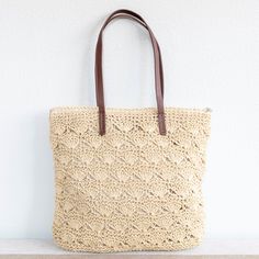 In Stock Fast Shipping from Los Angeles Add a touch of whimsy to your summer wardrobe with Elena Handbags' Straw Woven Fashion Bag. Made from lightweight straw, this bag features a playful floral design and a convenient zipper closure. Stay stylish and carefree all season long! Inside pocketDimensions: 16"H x 16.5"W x 1"DZipper closureStrap drop length: 10 inches Designer Style ID: 8478 Large Straw Woven Tote Bag, Summer Bag, Everyday Shoulder Bag, Beach Bag Lightweight Beige Straw Bag For Travel, Beige Crochet Bag For Daily Summer Use, Cream Crochet Bag For Daily Beach Use, Cream Straw Summer Shoulder Bag, Beige Summer Straw Bag For Everyday Use, Cream Straw Beach Bag For Summer, Beige Lightweight Straw Bag For Daily Use, Lightweight Beige Straw Bag For Daily Use, Cream Beach Bag For Spring Vacation