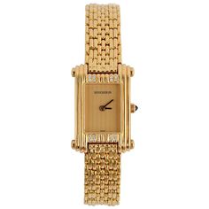 This versatile Boucheron 18 gold watch can be dressed up or down. It comes with a gold band or can be interchanged with either one of red leather or tan ostrich. The watch itself measures 11/16" x 1 1/8" to the edges. It has two diamonds both above and below the face. The stem is sapphire. The gold band measures half an inch wide. The watch with gold band has a wearable length of 6 3/4 inches. It is battery operated. Bucherer Diamond Watches, Luxury Gold Watch With Timeless Design, Luxury Vintage Yellow Gold Watch Bands, Ray Rectangle Gold Plated Cocktail Watch, Luxury Yellow Watch Accessories, Luxury Yellow Gold Polished Watch Accessories, Luxury Evening Watches With Gold Clasp, Luxury Modern Yellow Gold Jewelry And Watches, Luxury Modern Gold Jewelry And Watches